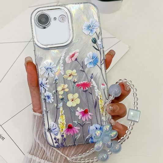 For iPhone 16e Electroplating Flowers Plants Texture Wristband TPU Phone Case(Wildflower FL2) - iPhone 16e Cases by PMC Jewellery | Online Shopping South Africa | PMC Jewellery | Buy Now Pay Later Mobicred