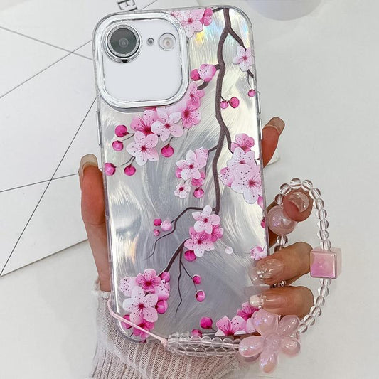 For iPhone 16e Electroplating Flowers Plants Texture Wristband TPU Phone Case(Plum Flower FL6) - iPhone 16e Cases by PMC Jewellery | Online Shopping South Africa | PMC Jewellery | Buy Now Pay Later Mobicred