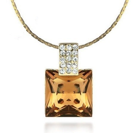 A gorgeous pendant necklace featuring a square-shaped crystal set in a beautiful beige hue, perfect for adding a touch of elegance and sophistication to any outfit.