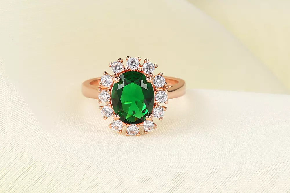 14K rose gold plated oval green emerald ring, elegant and sophisticated jewelry piece perfect for any occasion.